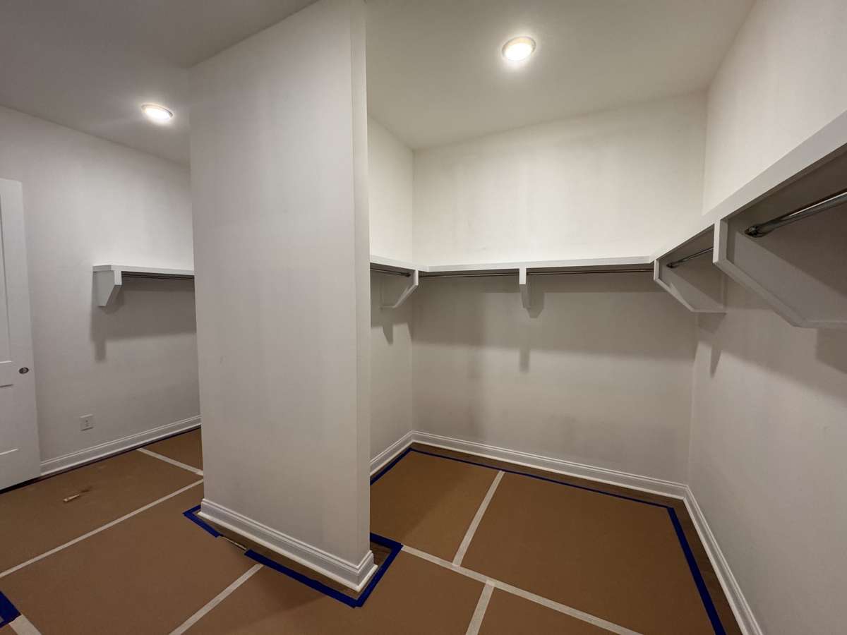 Another view of the Primary walk in closet.