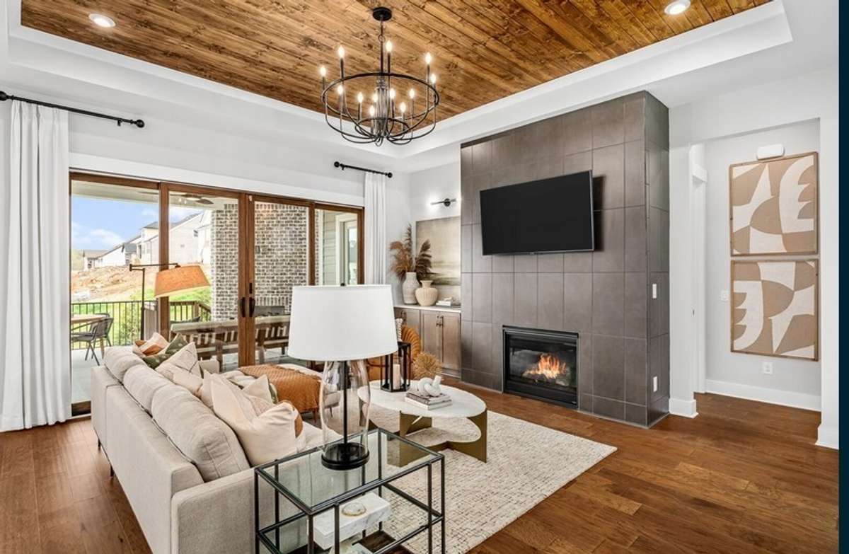 Family room.  All photos with furnishings are from a former Marshall model home and are not the home for sale. They are a likeness.