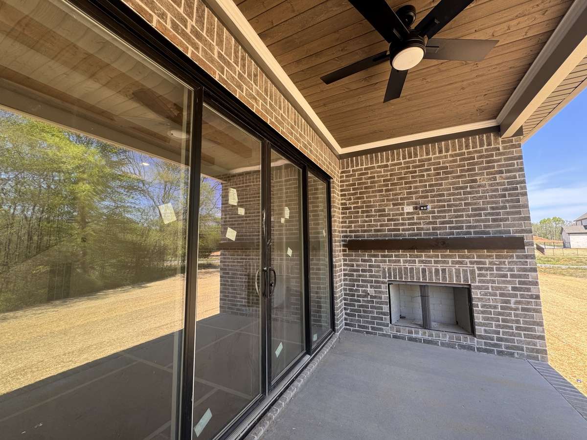Sliding doors open welcome you to the covered outdoor patio and with fireplace.