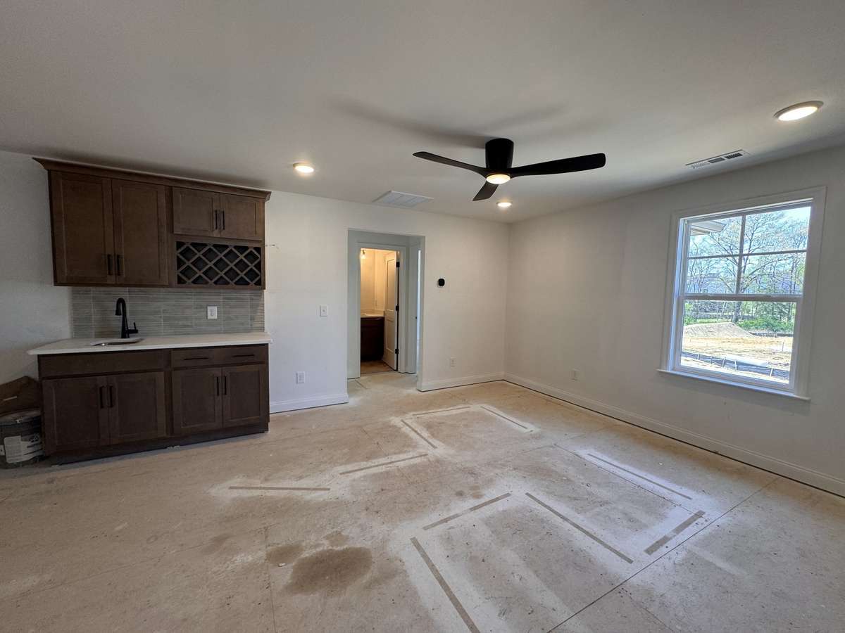 Second level Game room with built in bar.  Located off of the Game room is a Media room, three bedrooms and three full baths.  A second staircase leads you to the third floor which has a Flex space and half bath.