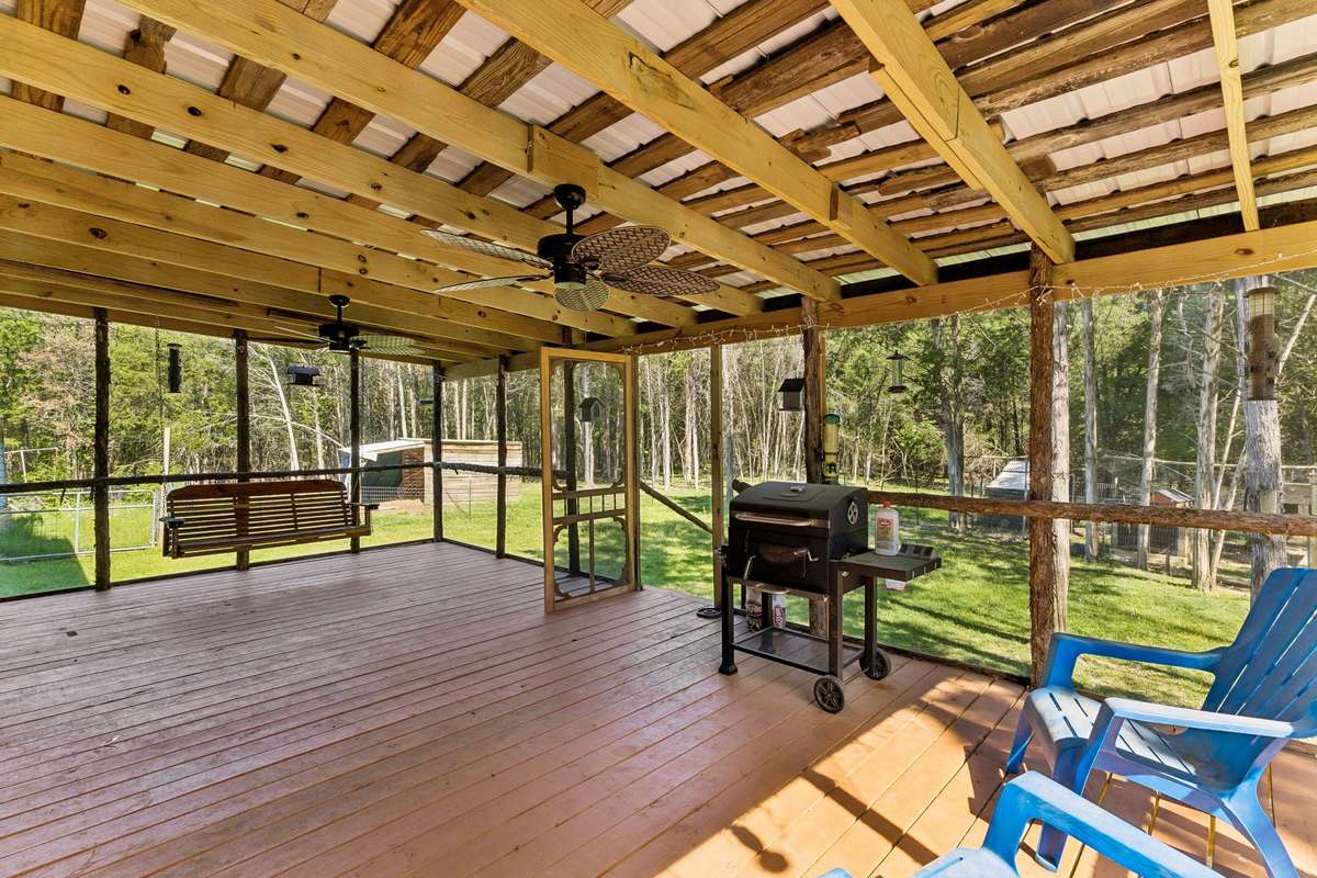 Now time for a little relaxation. This 25 x 14 covered and screened deck will offer you the opportunity to enjoy the beauty of the outdoors.