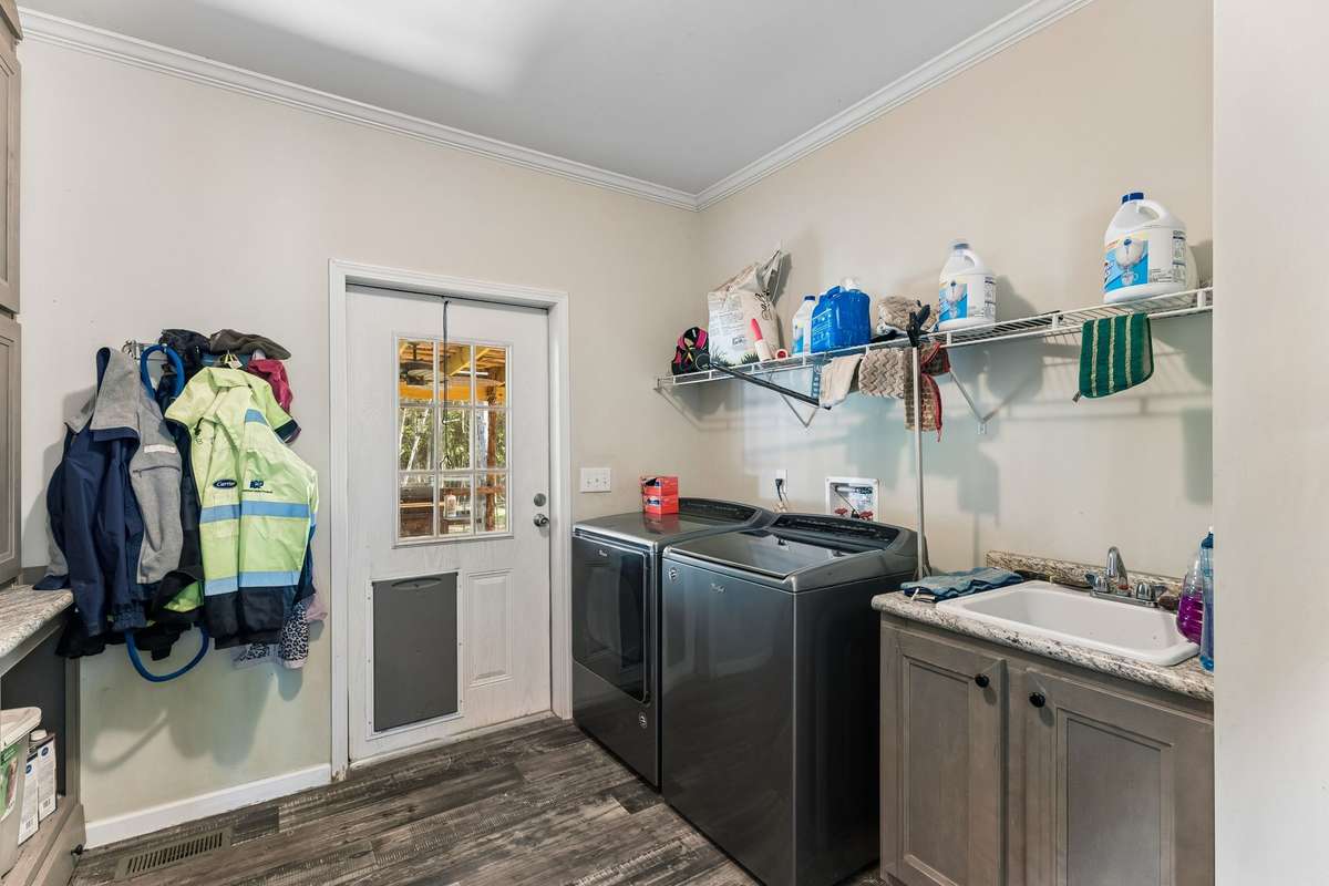 Laundry room has a mud sink