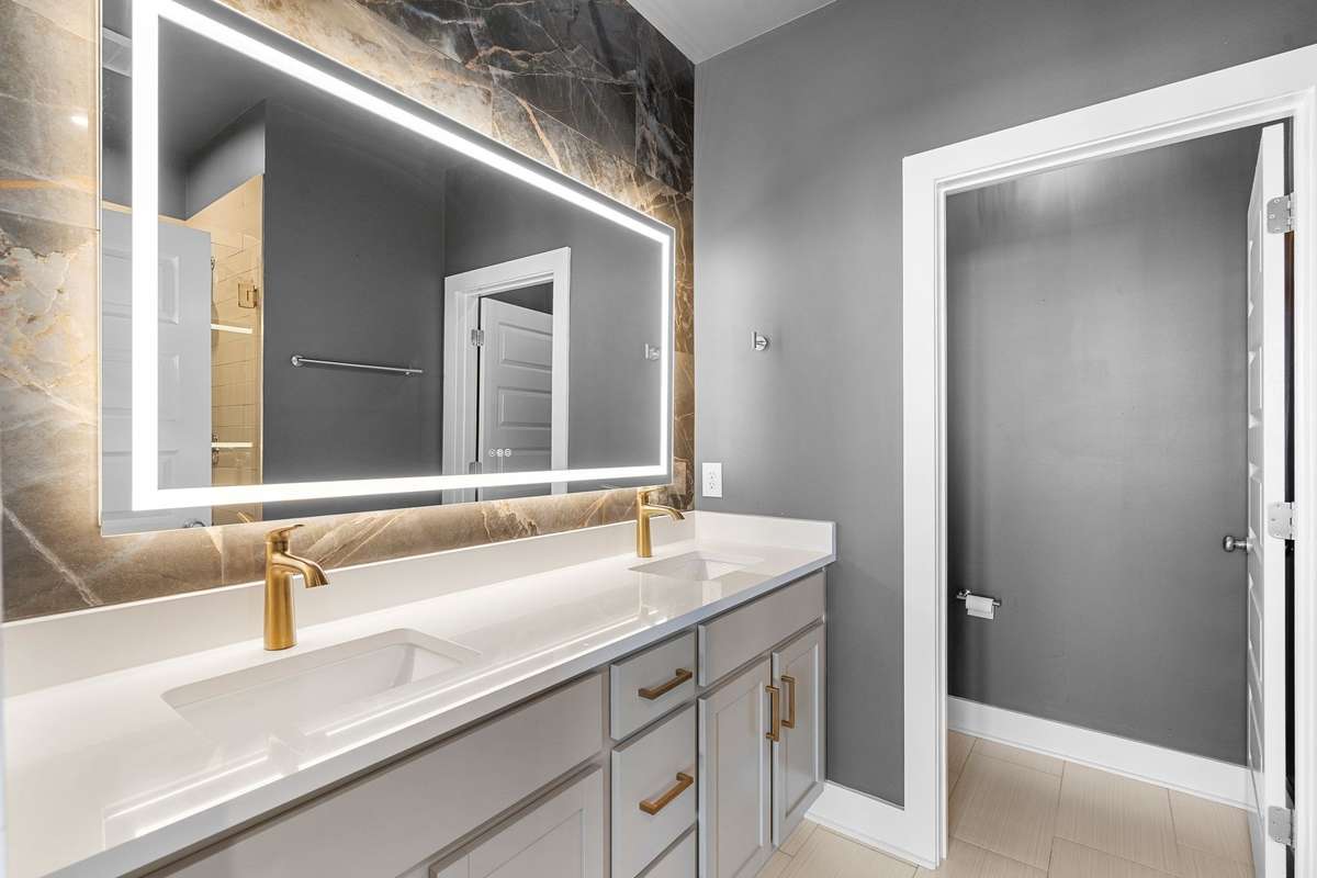 Double vanity and LED mirror! Custom tile accent!