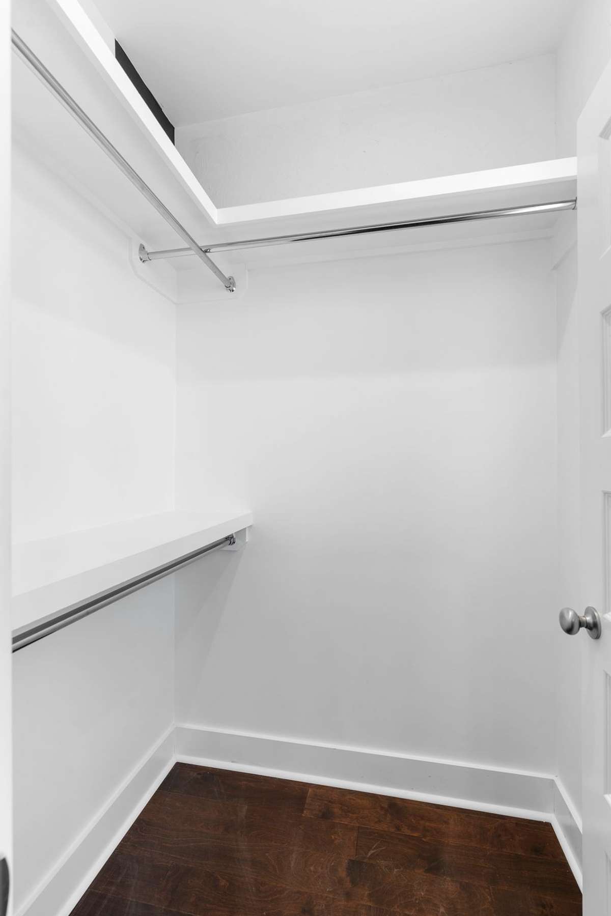 Built-in shelving for organization on the owner's closet!