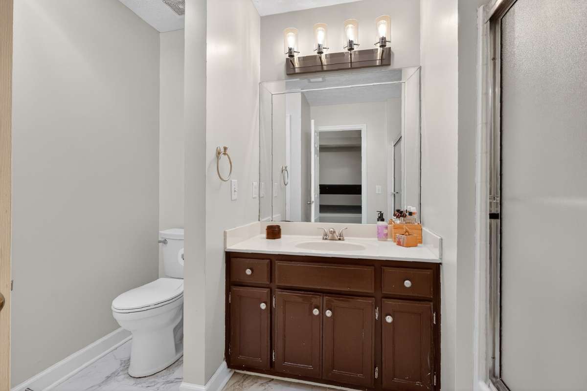 Another view of primary bath, a compact but well used space
