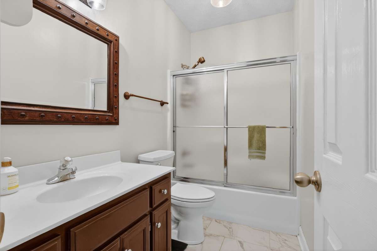 FULL basement level bathroom-there are 3 FULL bathrooms in this home!