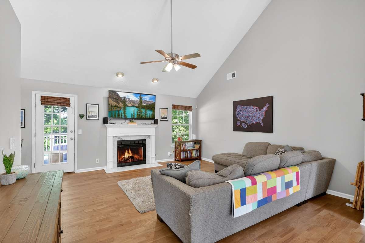 Tall ceilings newer and gorgeous flooring, and a gas fireplace are just a few of the features waiting for you!