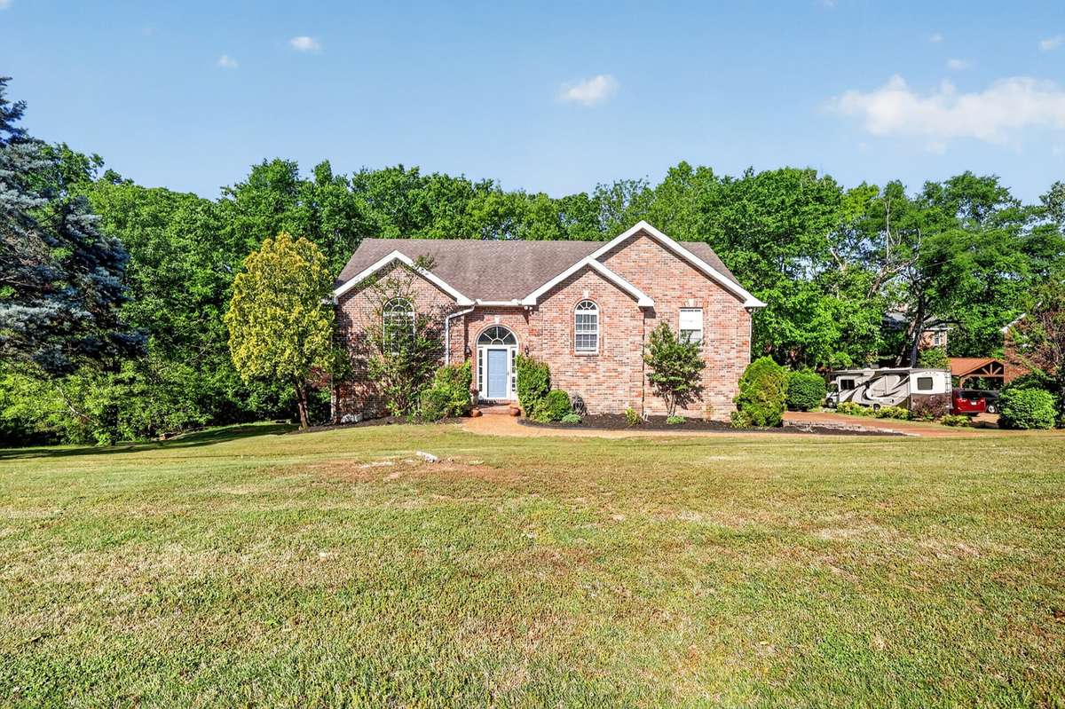 Almost half an acre lot, backs up to a tree line and did I mention no HOA?!
