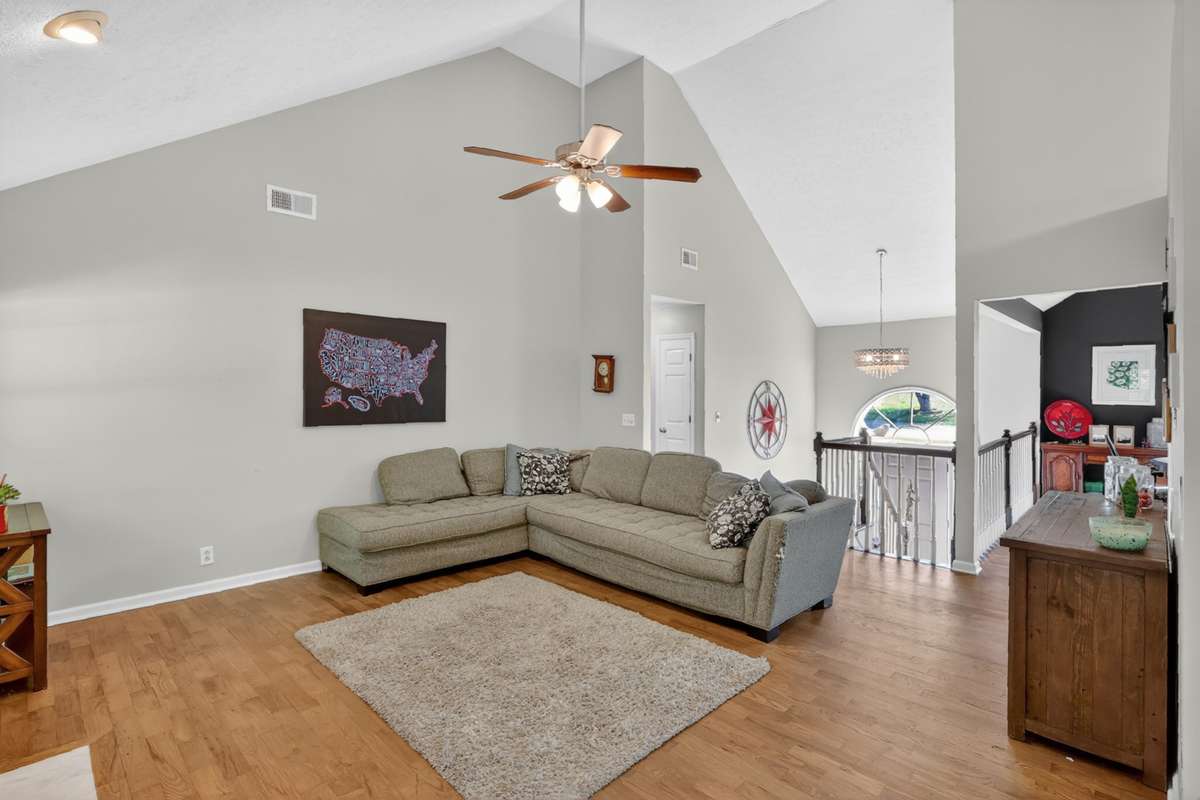 The living room can accommodate plenty of seating