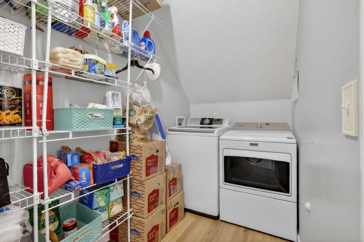 Laundry area and huge walk in pantry