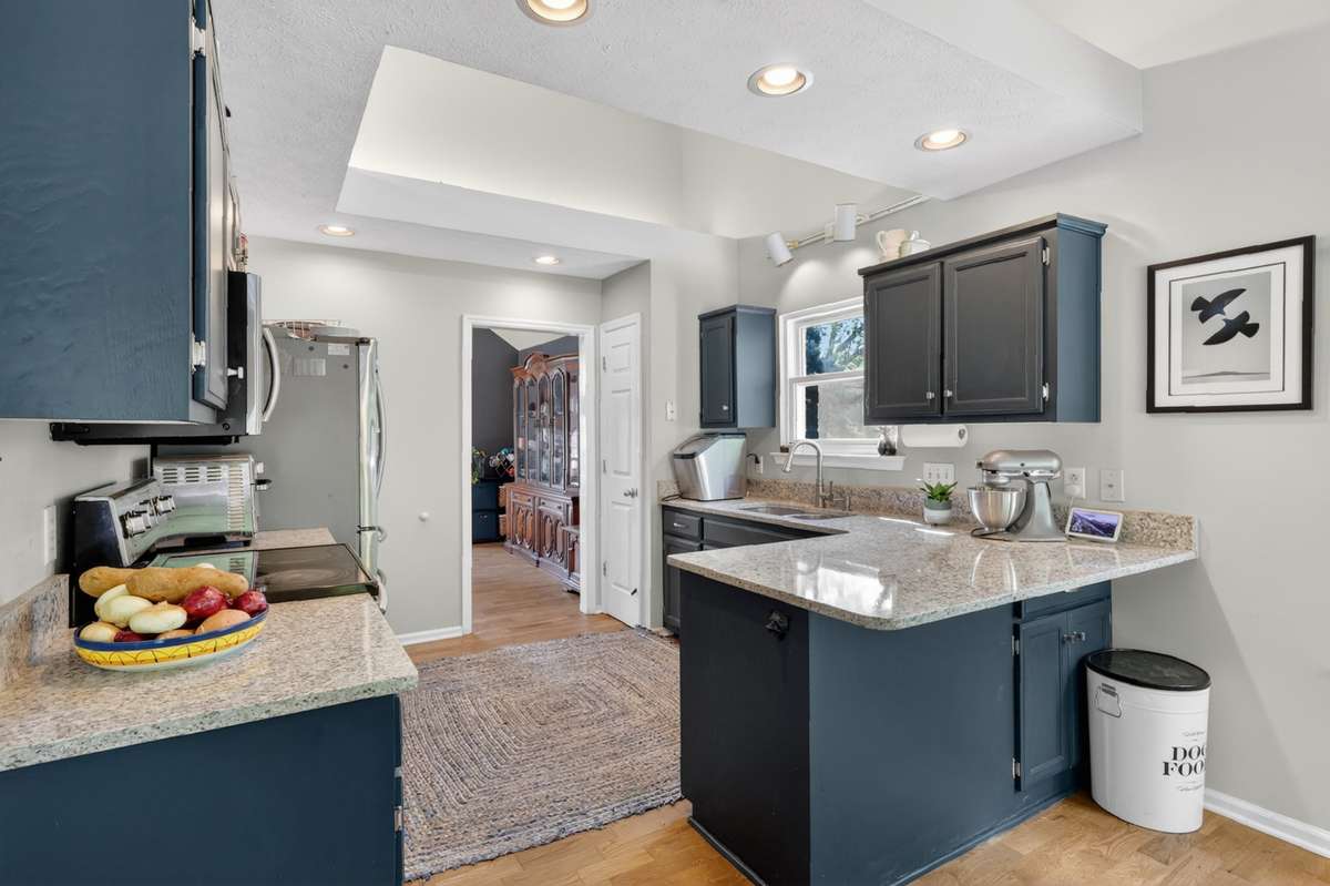 The blue cabinets are stylish and fun!