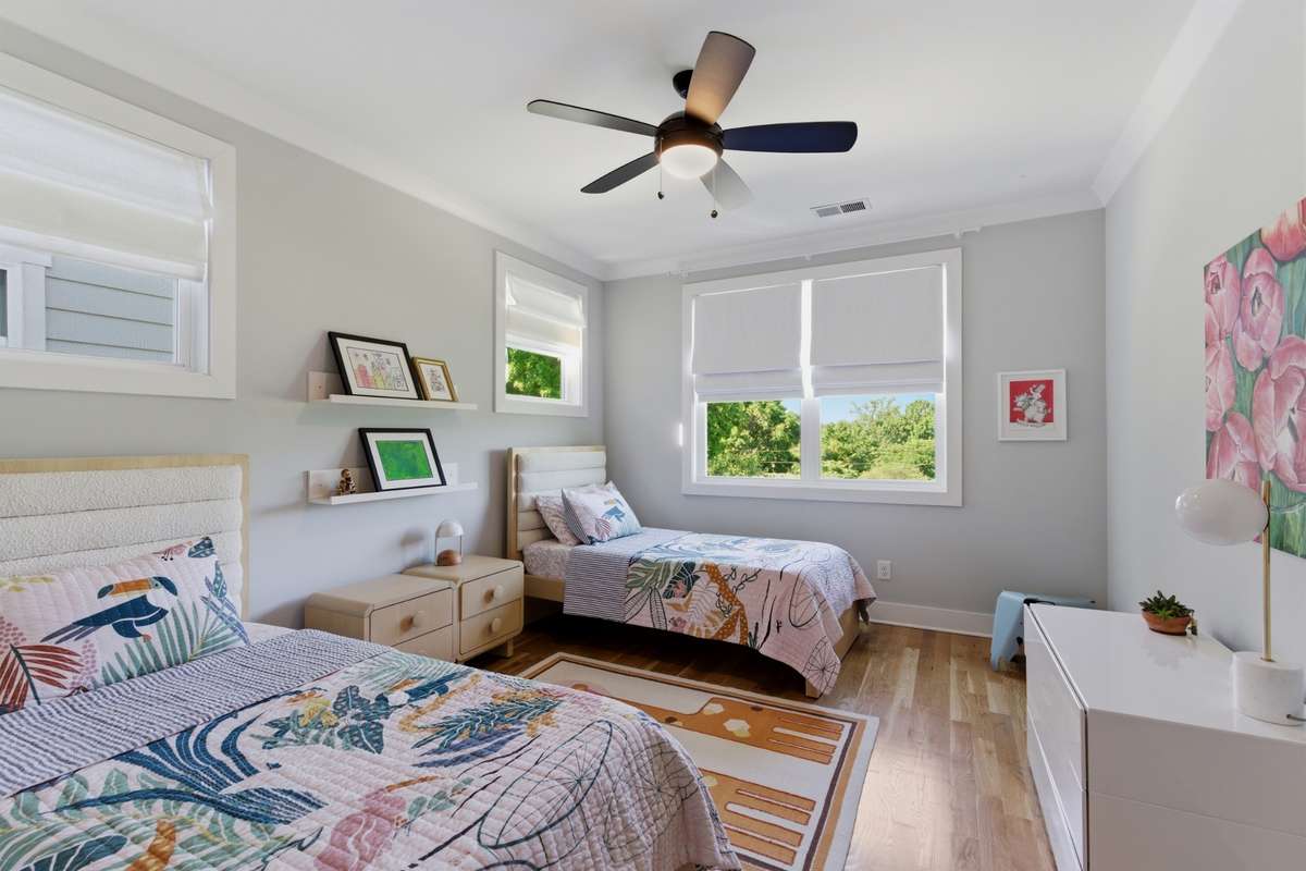 This level features two more comfortable guest bedrooms. Built-in shelving is found in all of the bedroom closets to help maximize your storage space.