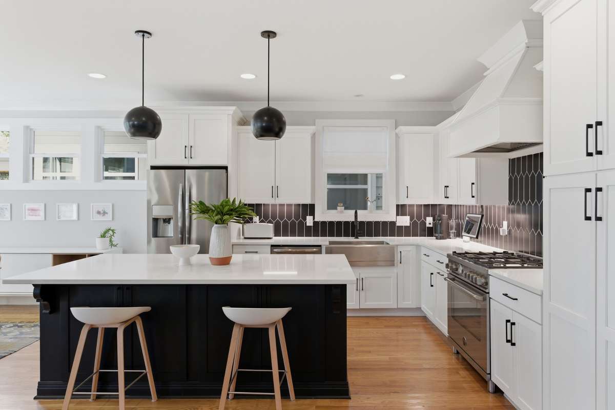 The kitchen is a chef's dream! The wide quartz island provides plenty of counter space.
