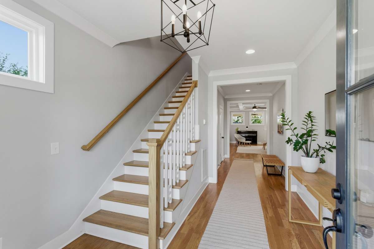 Step inside and discover oak hardwood floors throughout the home.