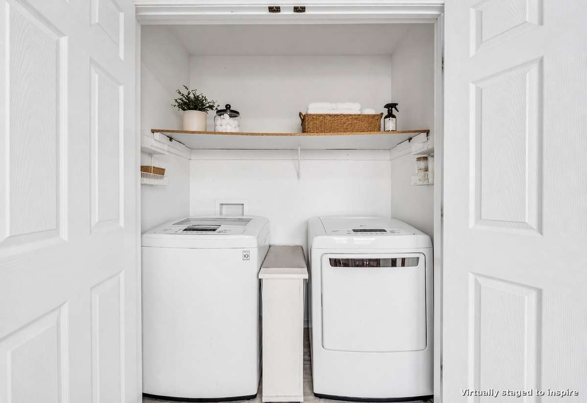 Laundry room located off the kitchen; washer and dryer included.