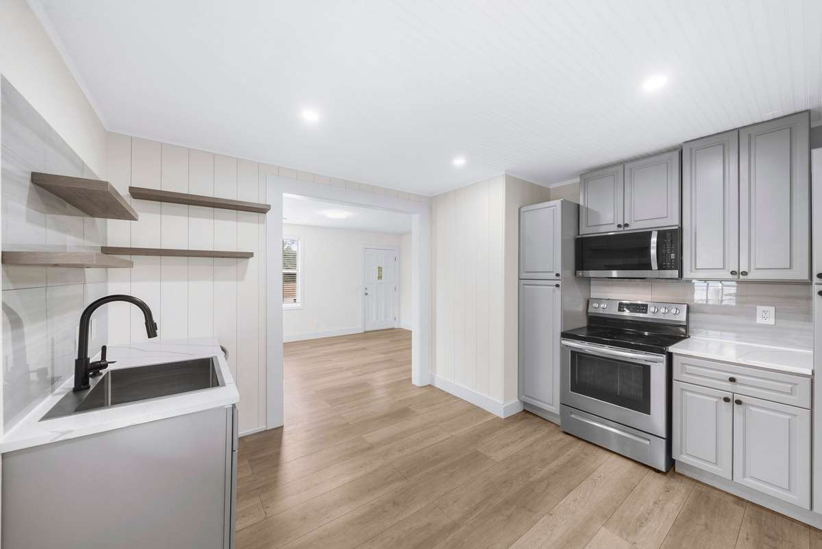 Kitchen with beadboard ceiling and added character