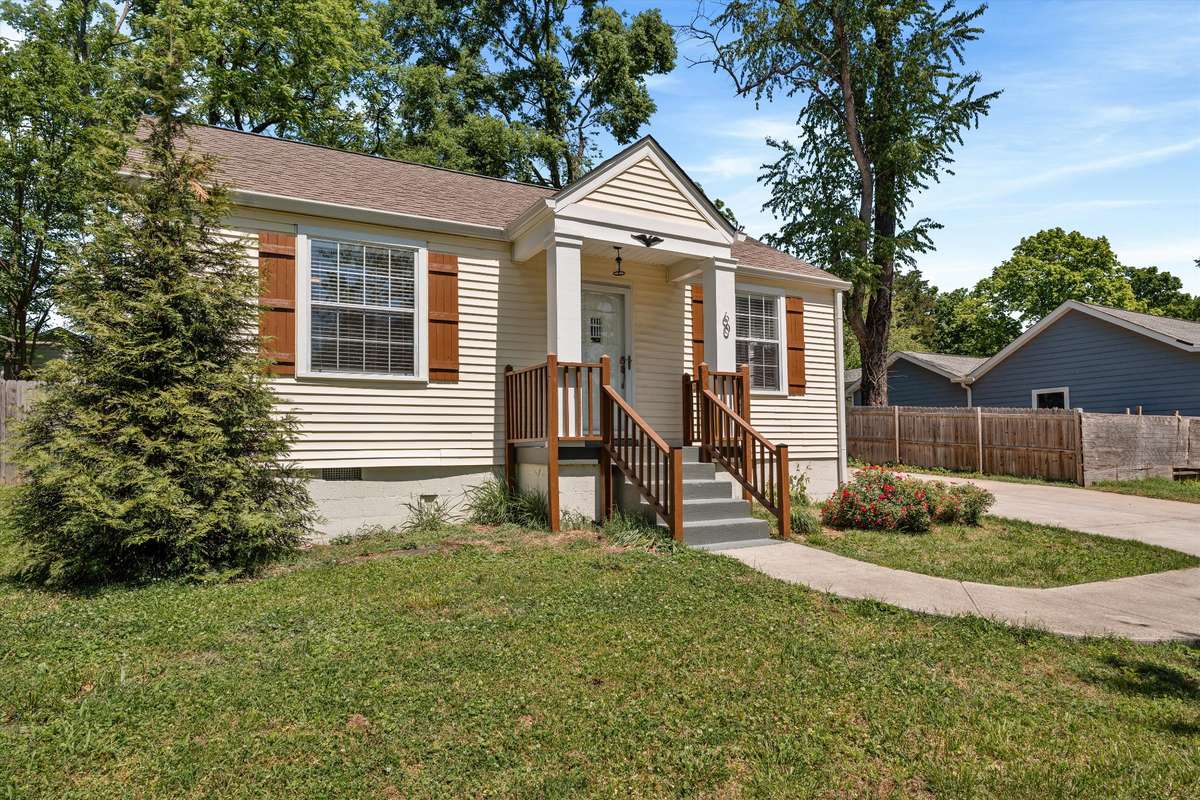 Front of home with spacious lot & wide driveway