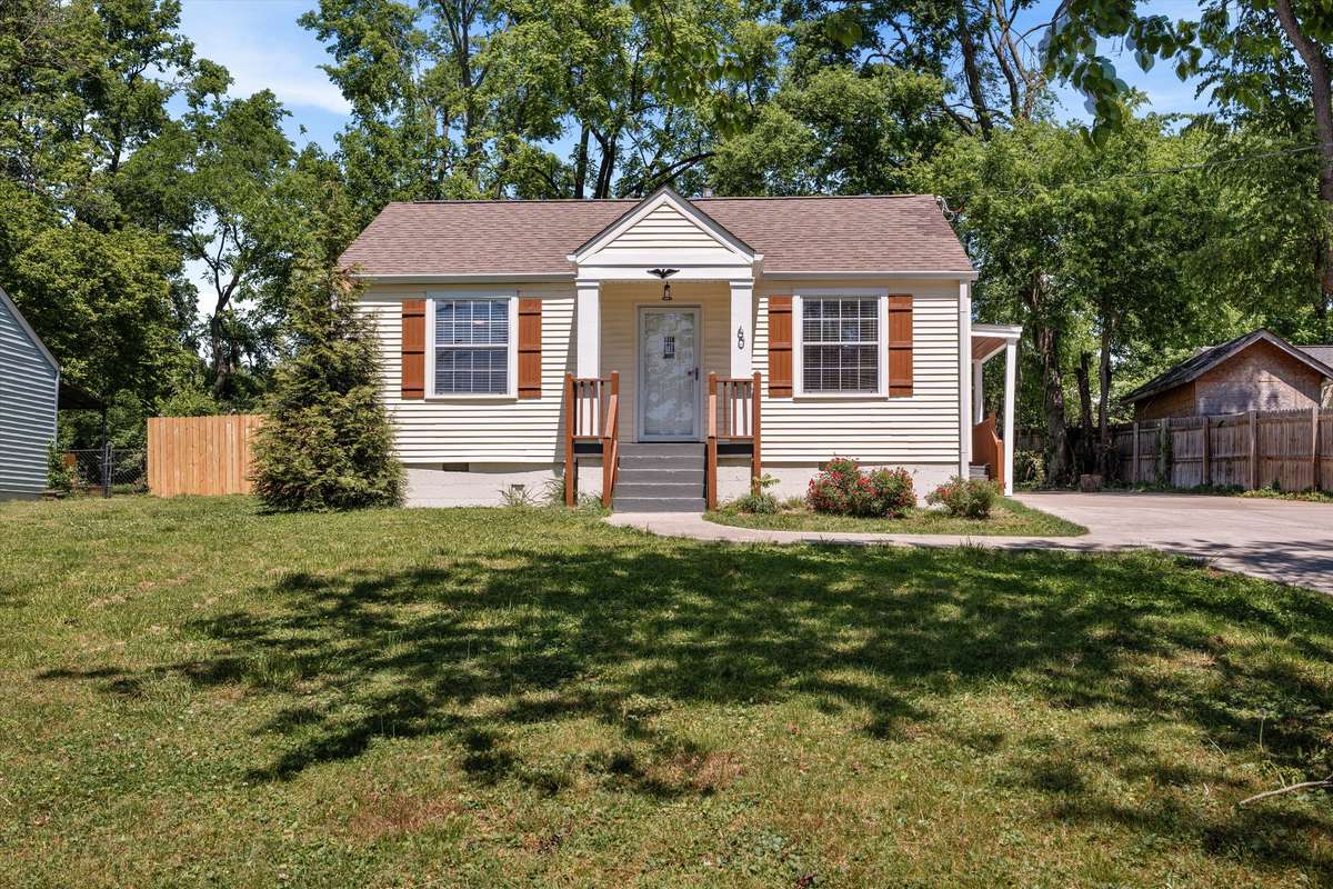Front of home with spacious lot & wide driveway