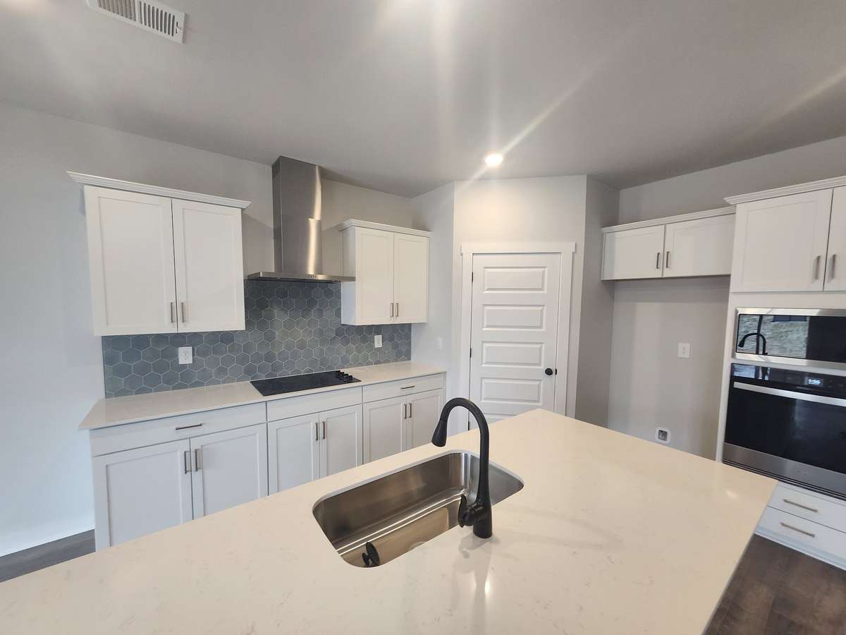 Photos are from a different home, see attached selected options for finishes