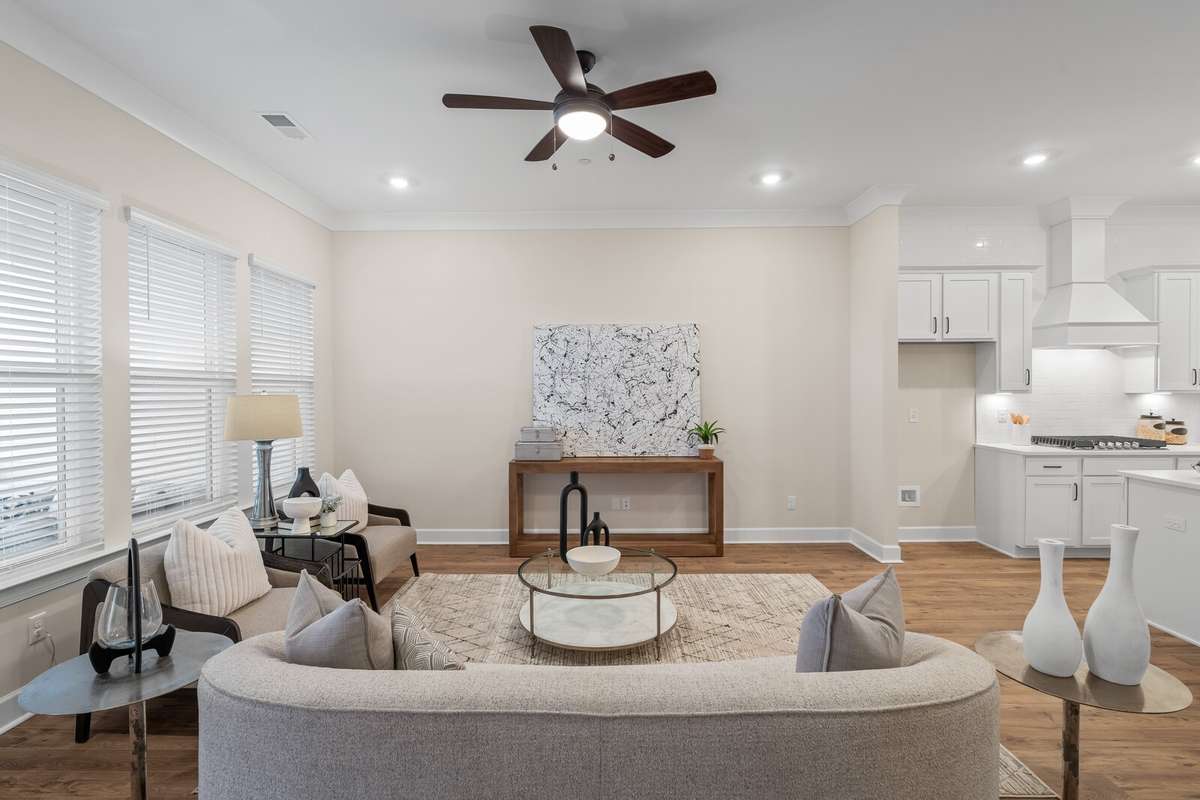 Wall of windows brings in a lot of natural light into this great room.
