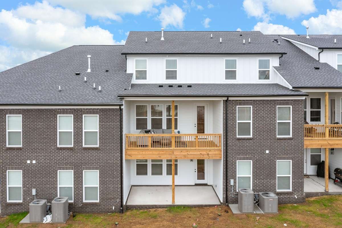 Look at how amazing the back of the Magnolia townhome with upper deck and lower patio