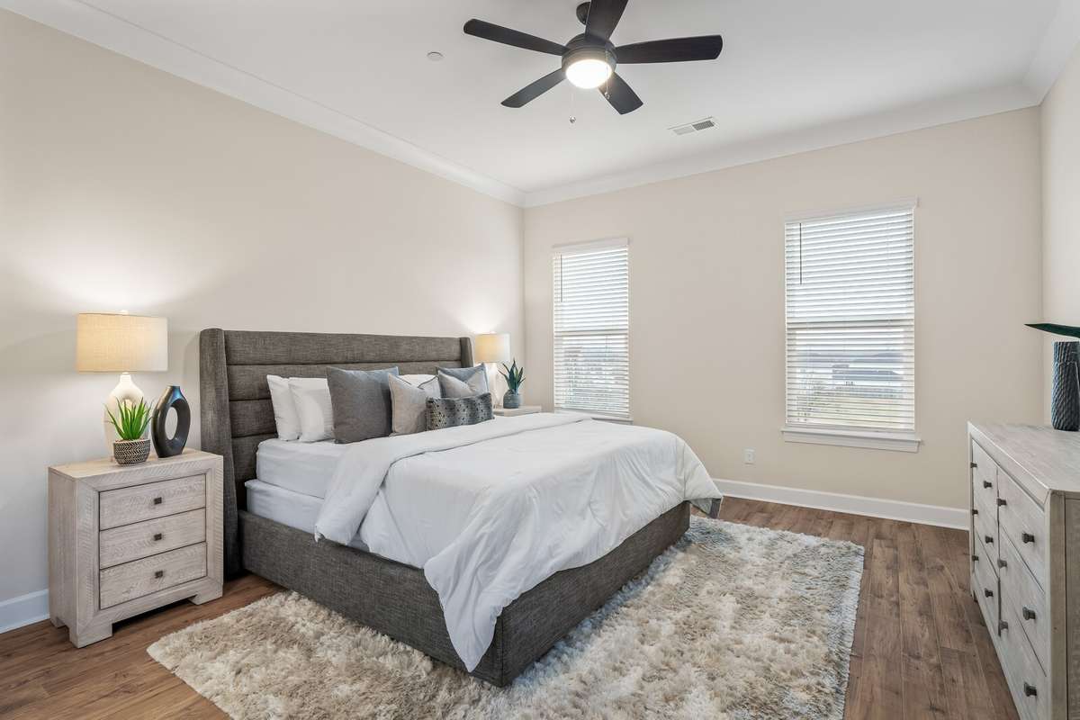 Large Primary bedroom on main floor with room for king size bed, two nightstands and large dresser.