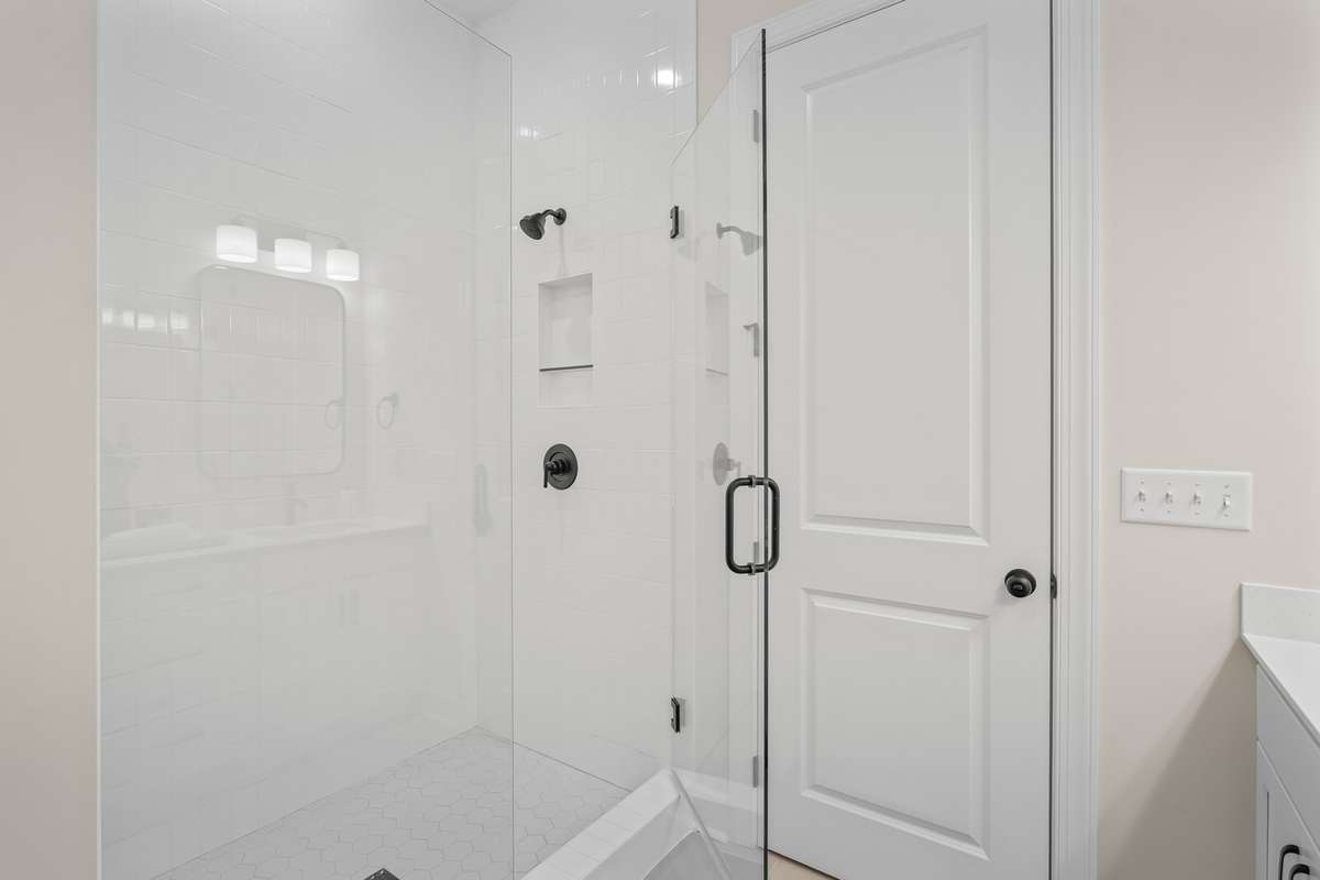 Beautiful tile shower and glass door