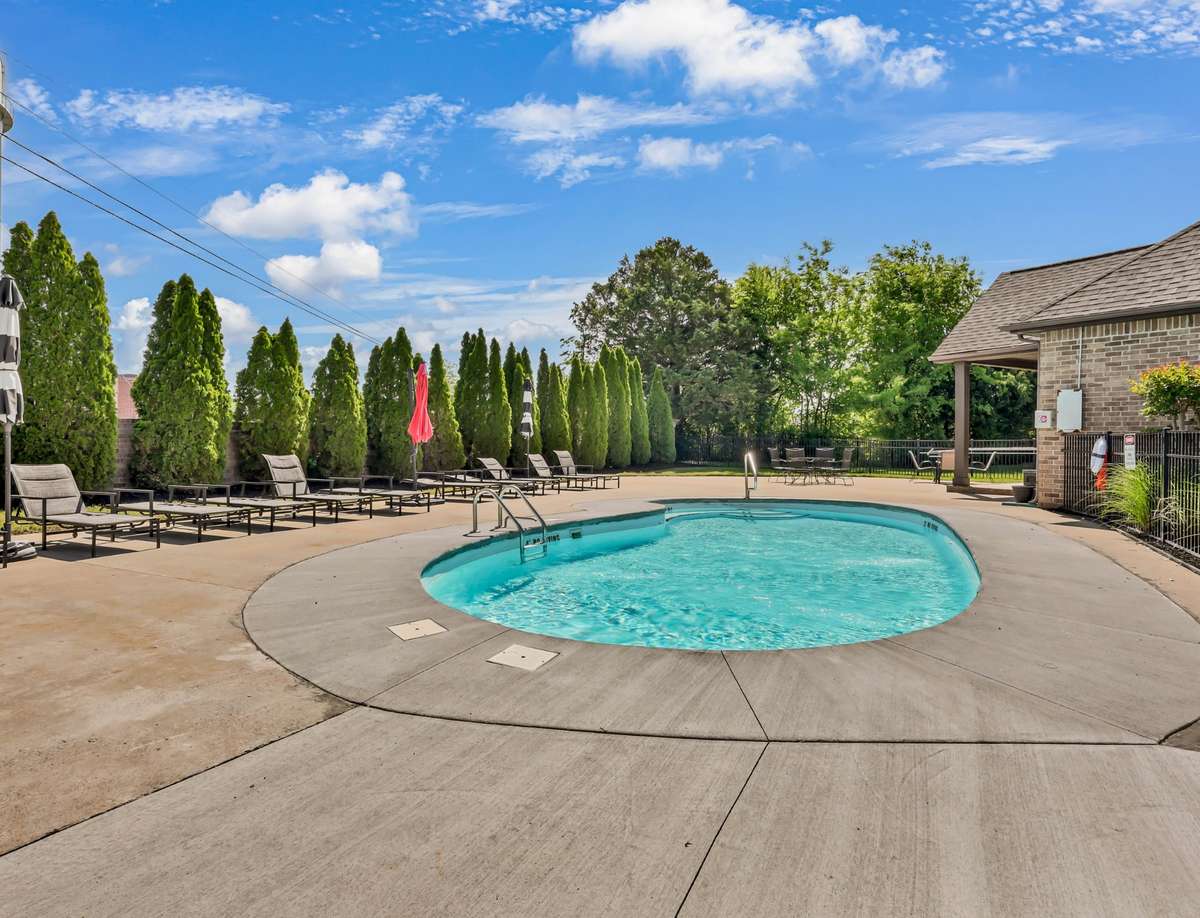 Experience the appeal of a prestigious gated community featuring a beautifully appointed clubhouse and resort-style pool, perfect for relaxing, gathering, and enjoying a true neighborhood lifestyle.