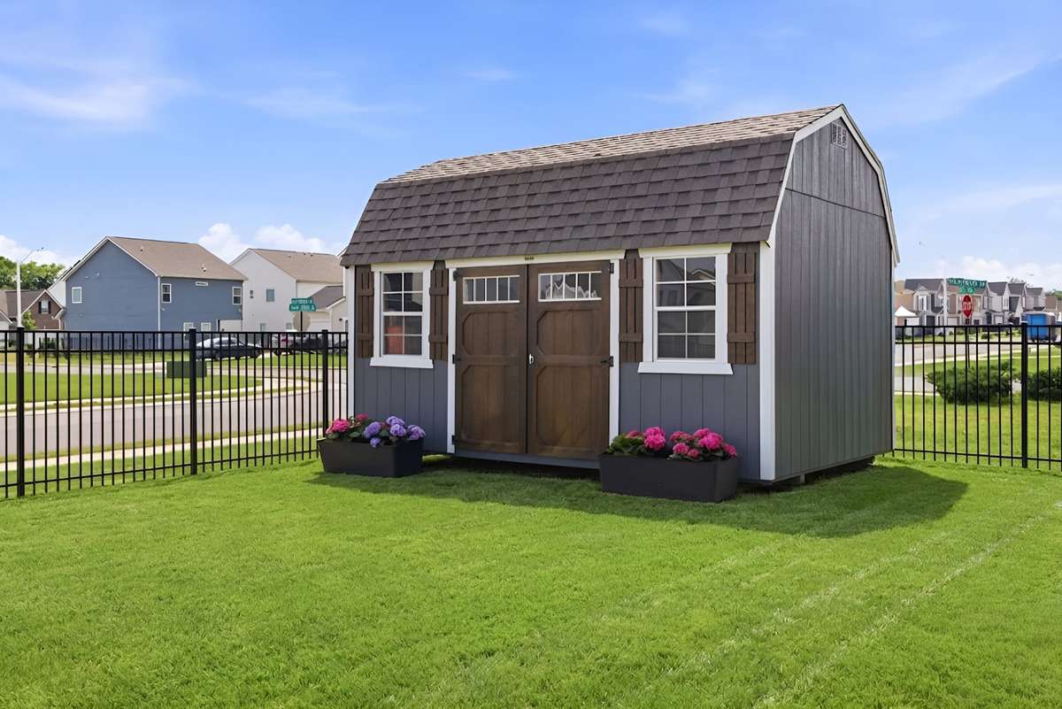 Detached backyard shed offering flexible use as a she shed, studio, or dedicated storage space—an added bonus that expands the home’s functional living potential