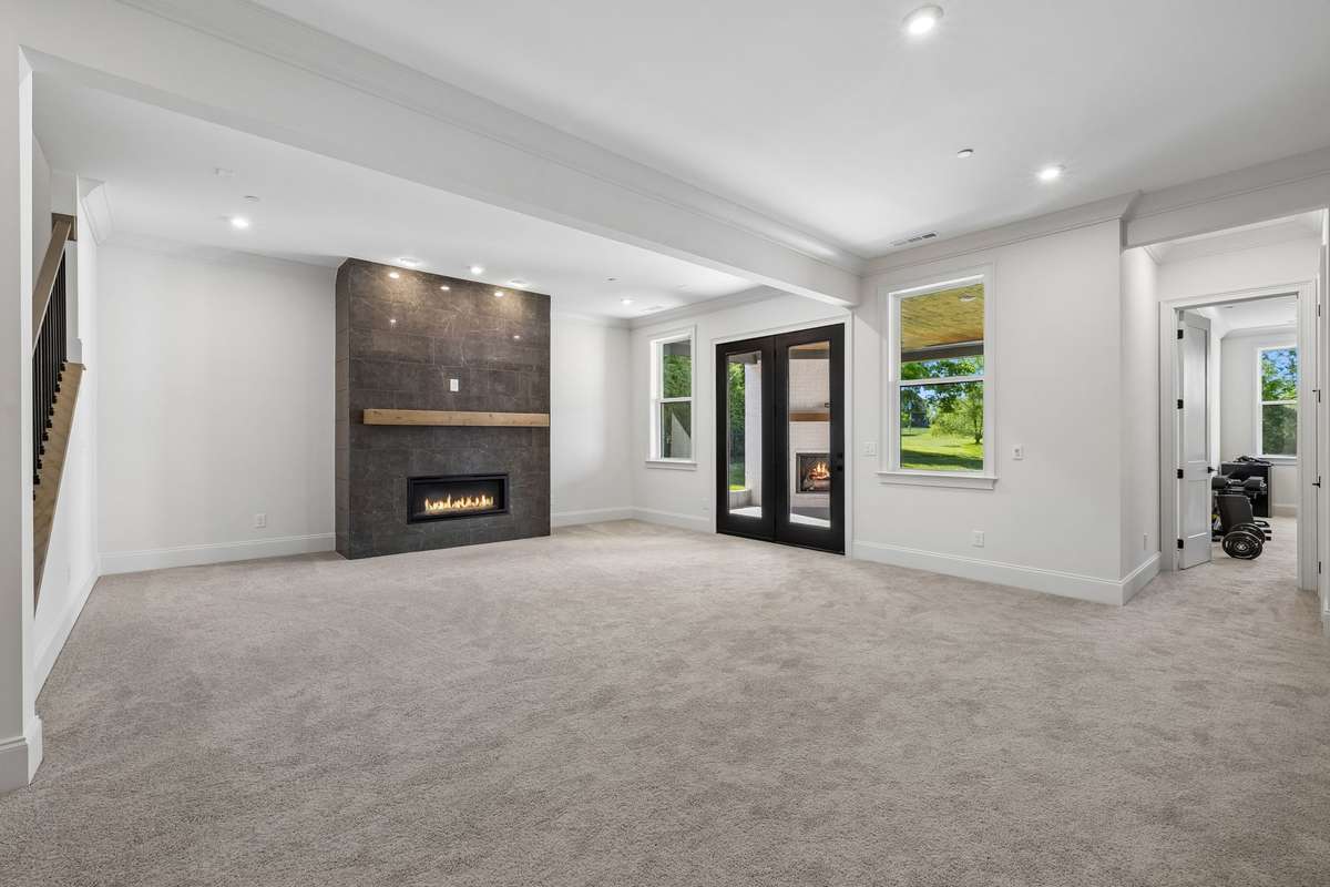 Basement Level Bonus Space with French Doors to the Downstairs Outdoor Space