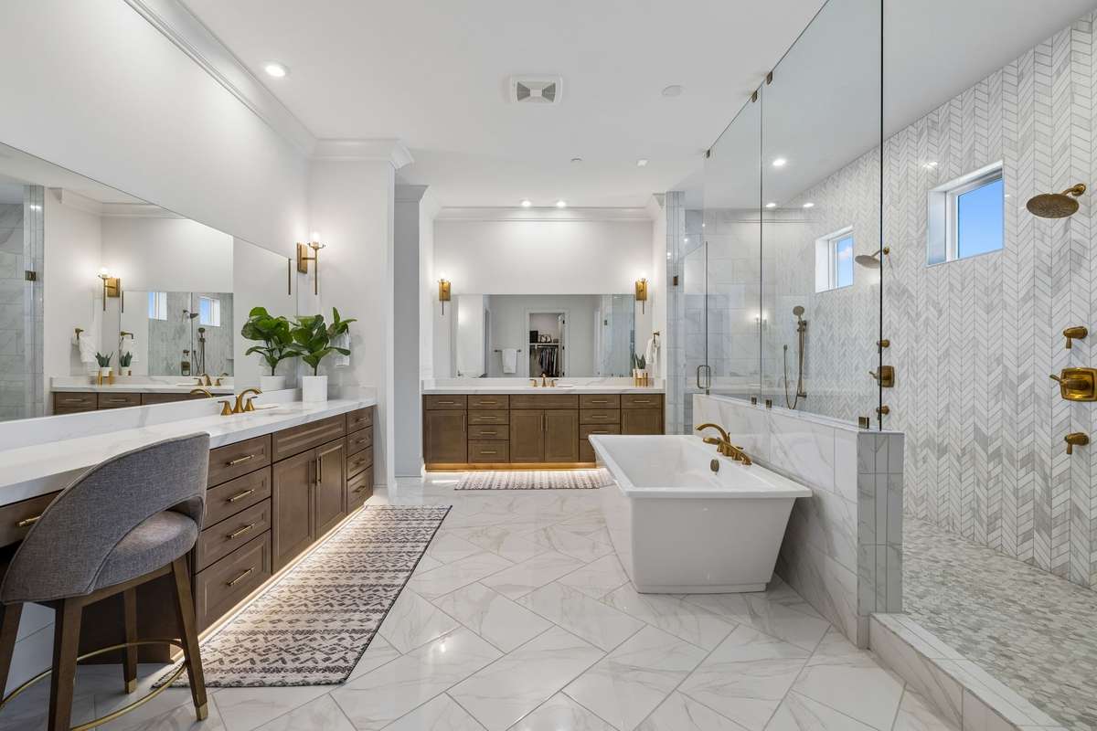 Consider the Primary Bath, your personal spa retreat. Featuring a soaking tub, a spacious shower with two shower systems, toe kick lighting and plenty of counter space.