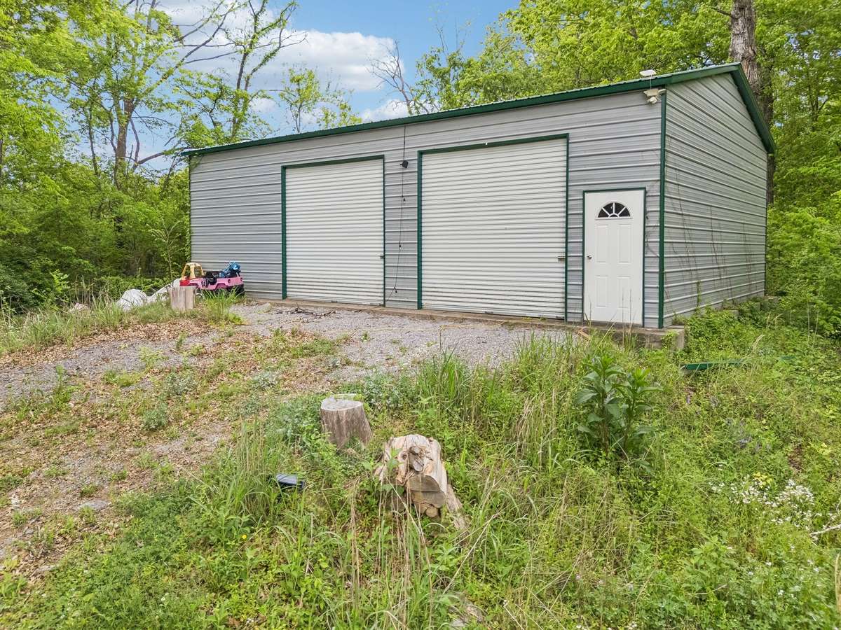 28X41 Metal Building with two 12 ft roll up doors