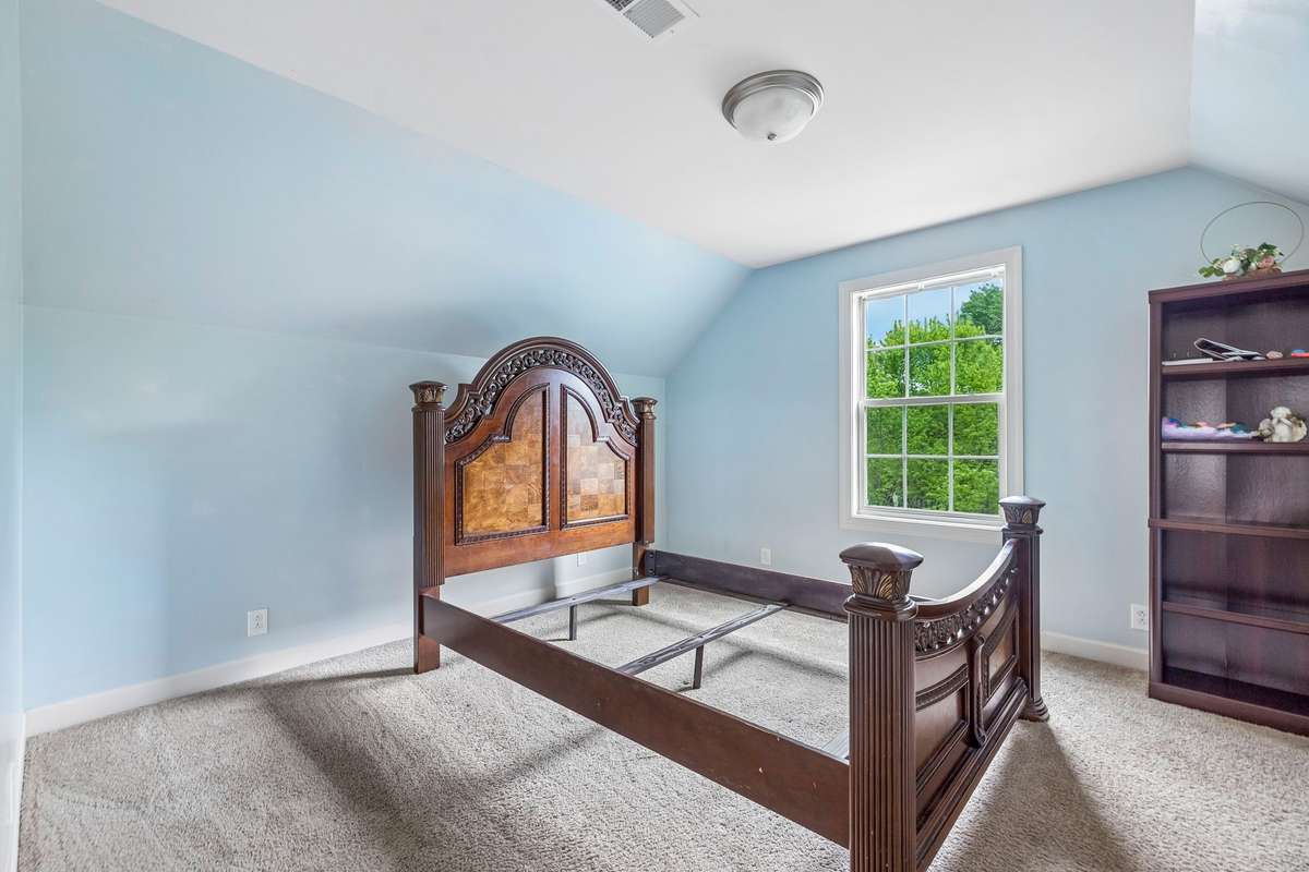Upstairs room currently being used as a 5th bedroom