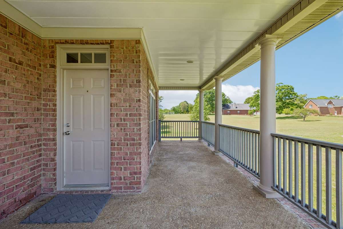 Second entry with massive porch off side of the house! Get the rocking chairs out!