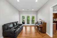 Sitting area off the kitchen. Doors open to a Large private deck