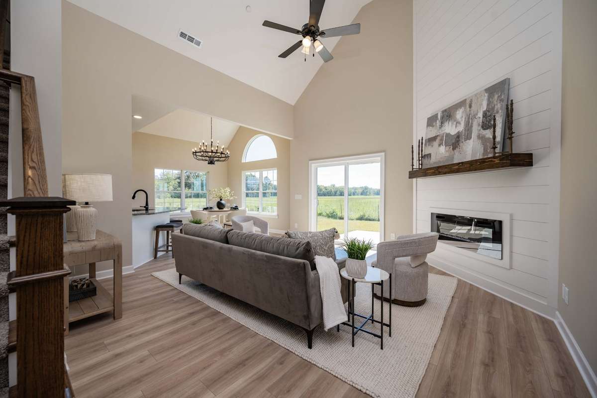 Photo from previous build of the same plan. Living room into dining and kitchen