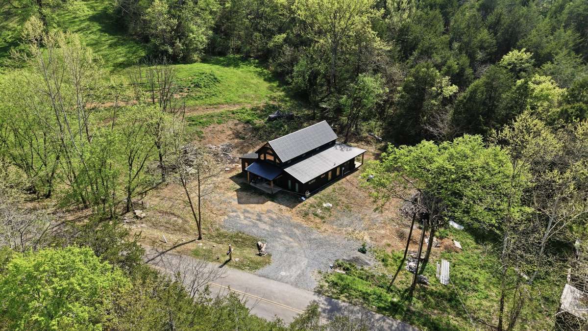 This image has been digitally enhanced using AI to remove dirt and tree trimming debris. Original, unedited listing photos are provided for reference.