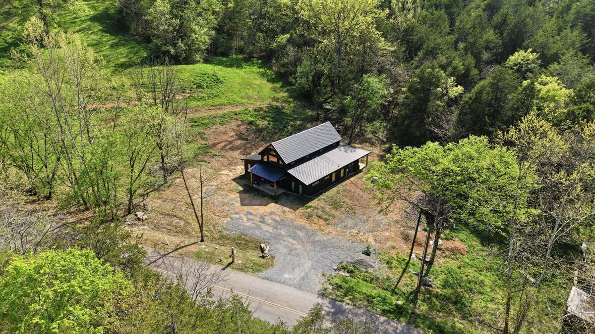 This image has been digitally enhanced using AI to remove dirt and tree trimming debris. Original, unedited listing photos are provided for reference.