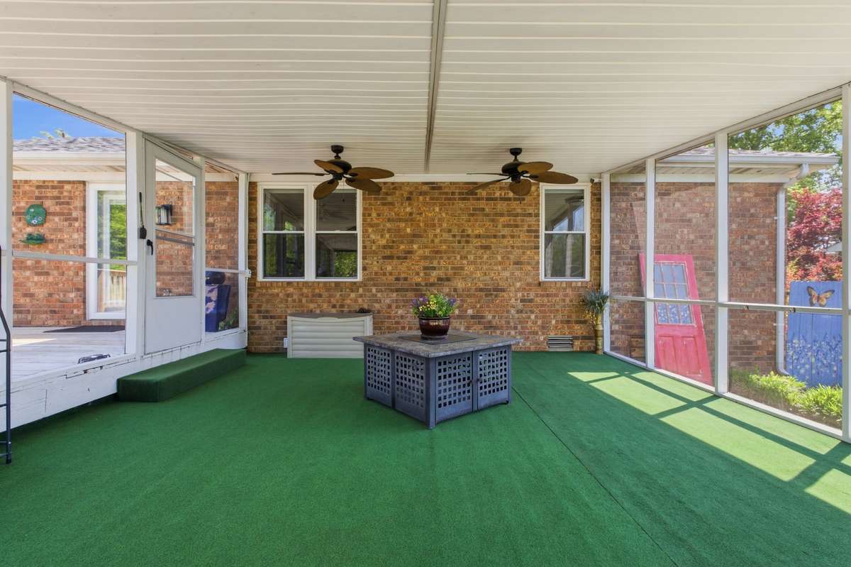 Screened-in porch for year-round enjoyment - - morning coffee to evening unwinding.