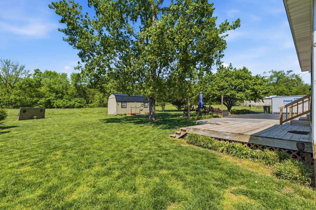 Large, level backyard with room to play, garden, or simply enjoy the outdoors