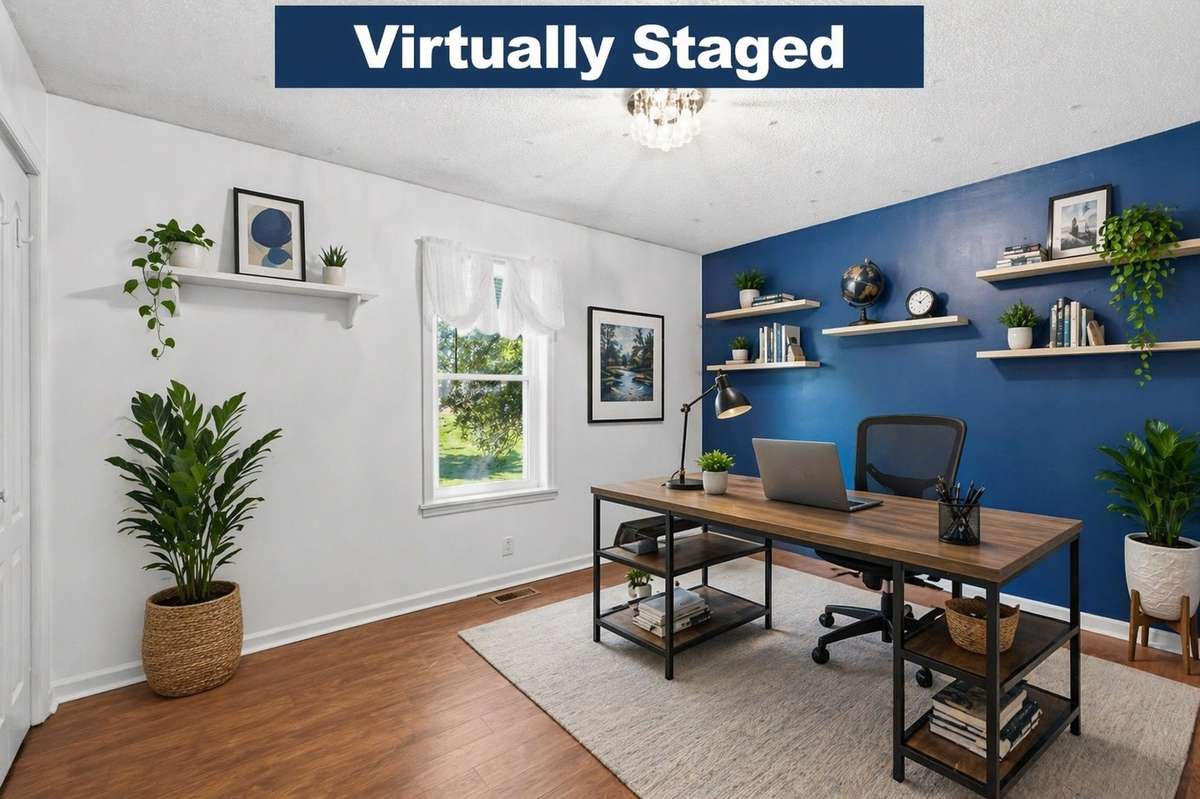 Virtually staged to showcase a flexible home office or bedroom space.