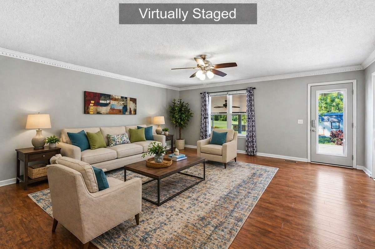Virtually staged to showcase the potential of this spacious great room - - perfect for everyday living and entertaining
.