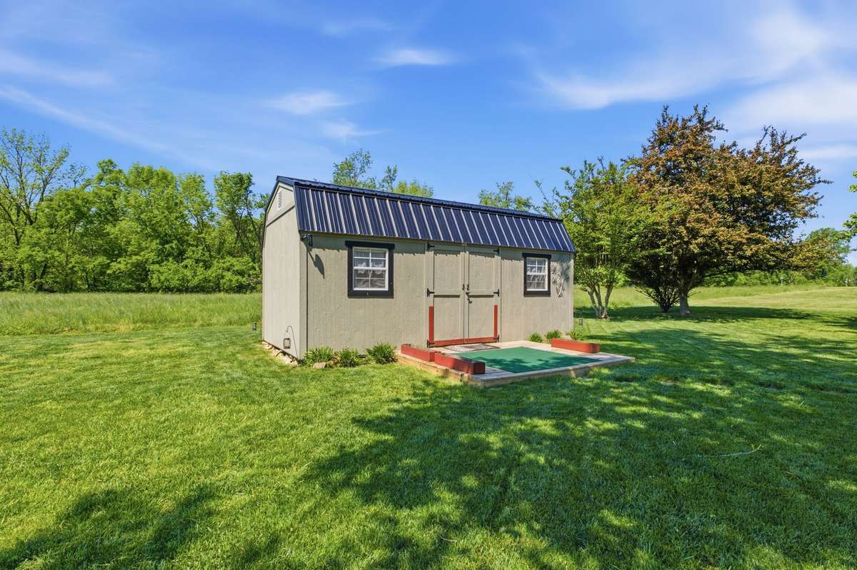 Detached storage building - - ideal for tools, hobbies, or extra space.