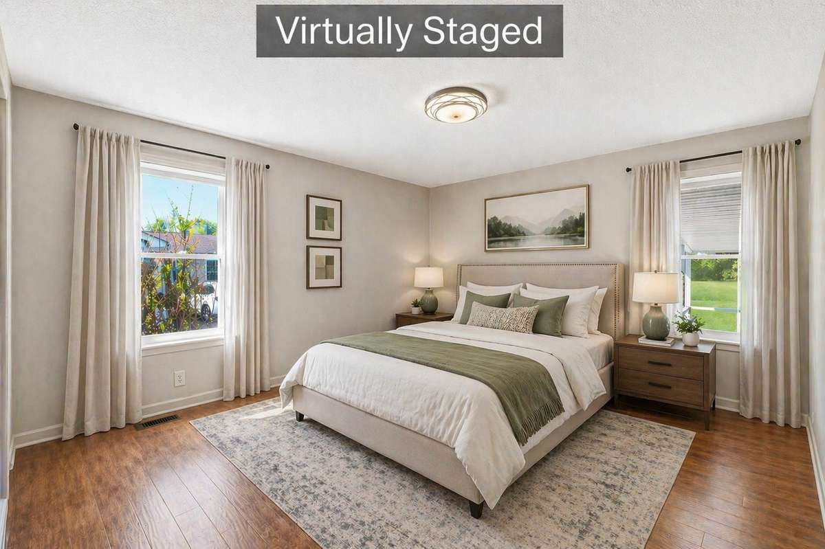 Virtually staged to showcase the spacious primary suite with flexible layout options.