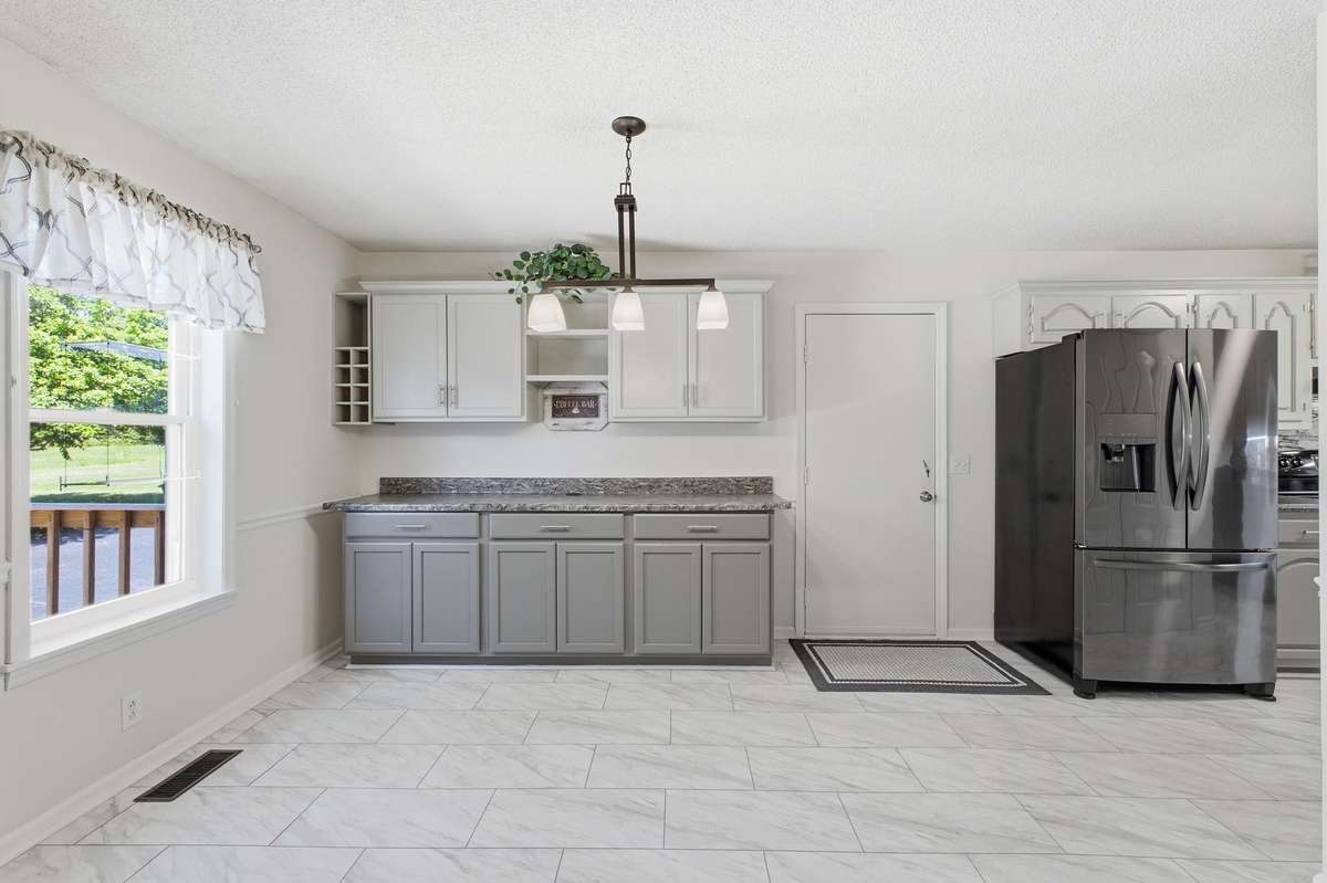 Bright eat-in kitchen with generous prep space and room to gather.