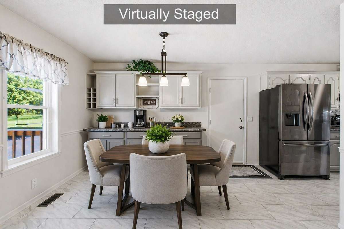 Virtually staged to showcase how this bright dining space can come to life  -- perfect for everyday meals or gathering with friends.