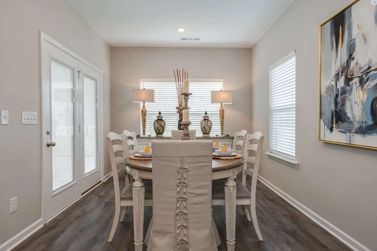 Stock Photo: Separate Dining area w/ hinged door leading out to covered back porch