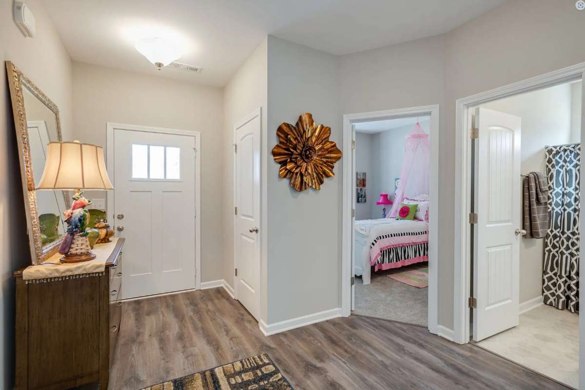 Stock Photo: Entryway Foyer - Two Bedrooms up front w/ a full bath separating them
