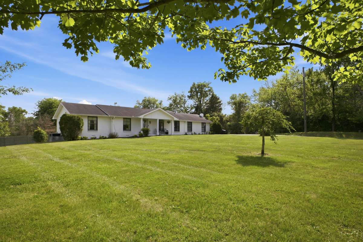 The home sits nicely on the lot and overlooking Concord Rd which makes for a very private park-like location.