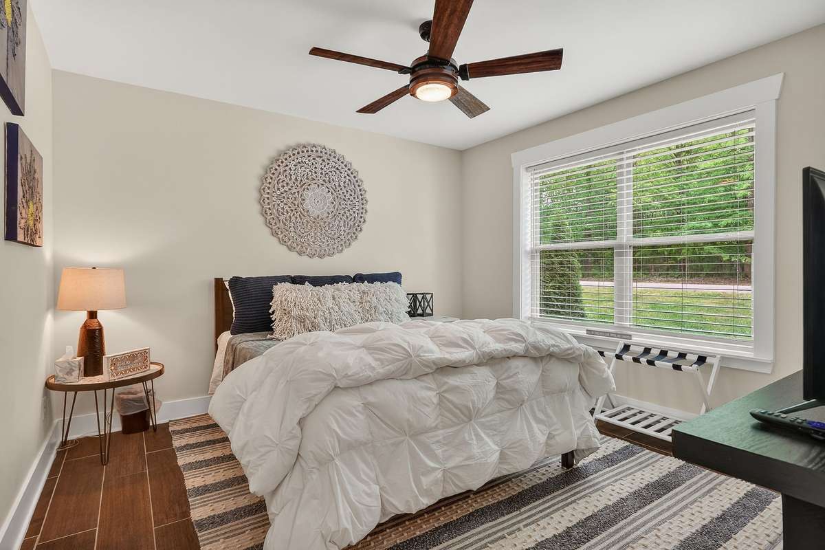 Guest bedroom is just as luxurious as the primary.